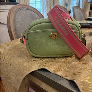 Coach Green Crossbody Bag with Pink Strap and green slim leather strap.